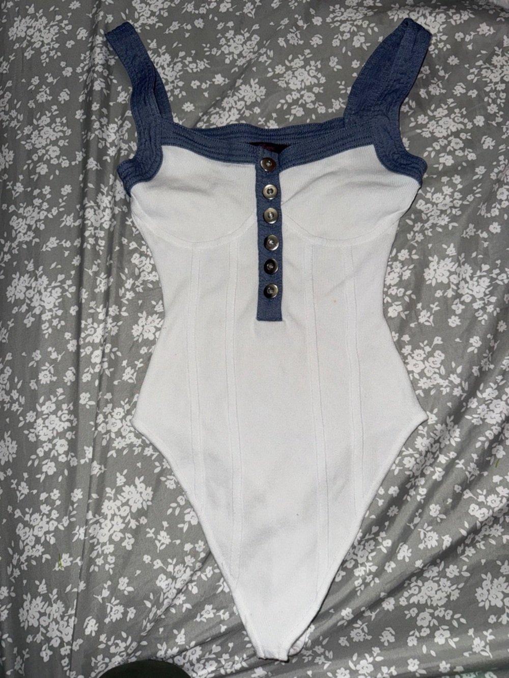White Ribbed Bodysuit with Blue Trim and Button Placket